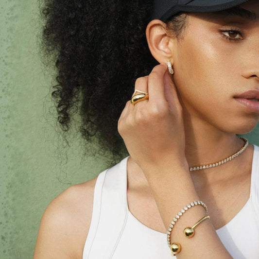 Lyndsay Huggie Gold Hoop Earring - She Chester