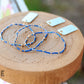 Extends - Hope Unwritten Bracelet - Blue Metallic - She Chester