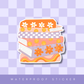 Retro Book Stack Sticker: 2.5"