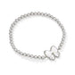 Haley Bow Rhodium Ivory MOP Stretch Bracelet - She Chester
