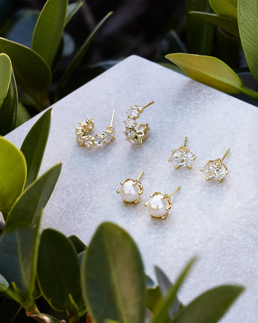 CAILIN CRYSTAL HUGGIE EARRINGS GOLD METAL WHITE CZ