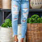 Hi Rise Destroy Light Wash Shark Hem Skinny