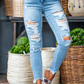 Hi Rise Destroy Light Wash Shark Hem Skinny